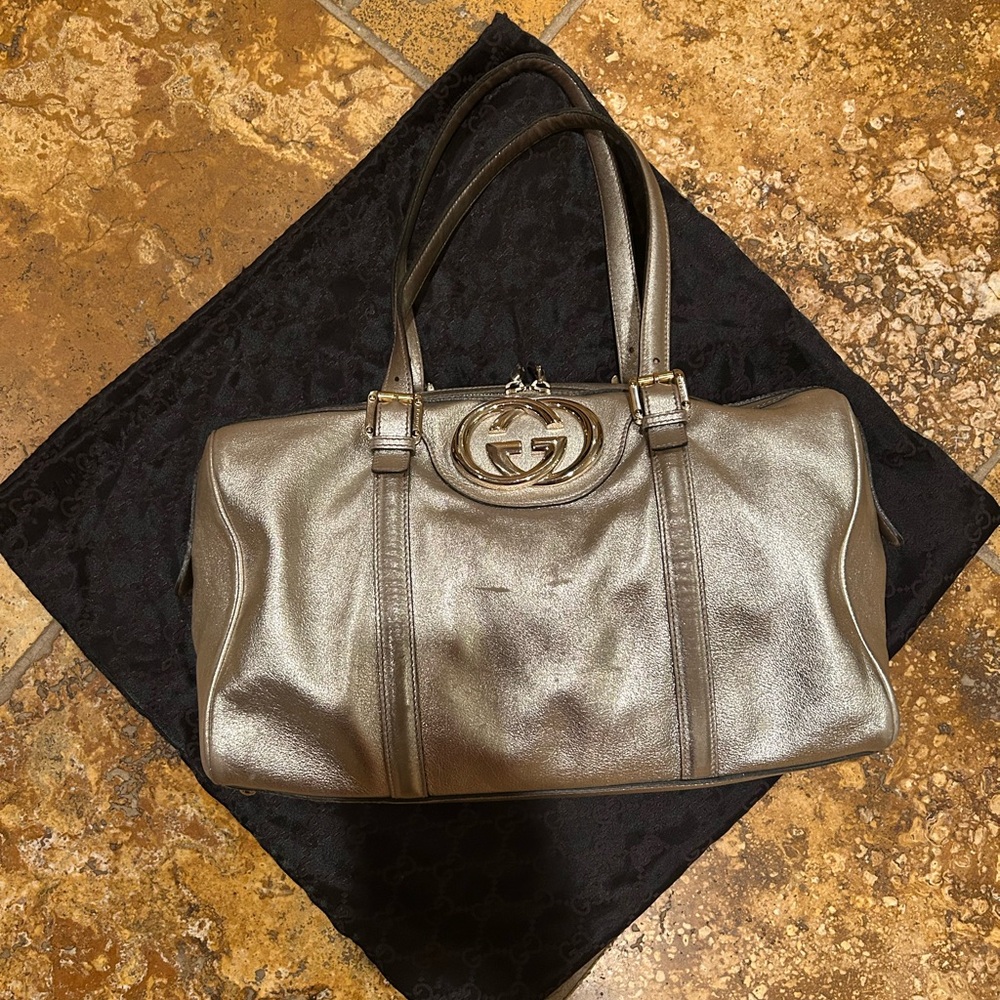 Gucci Shoulder Bag with Metallic Finish. Large dust bag.
